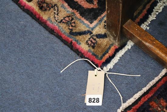 A Baluchi rug 245 x 110cm